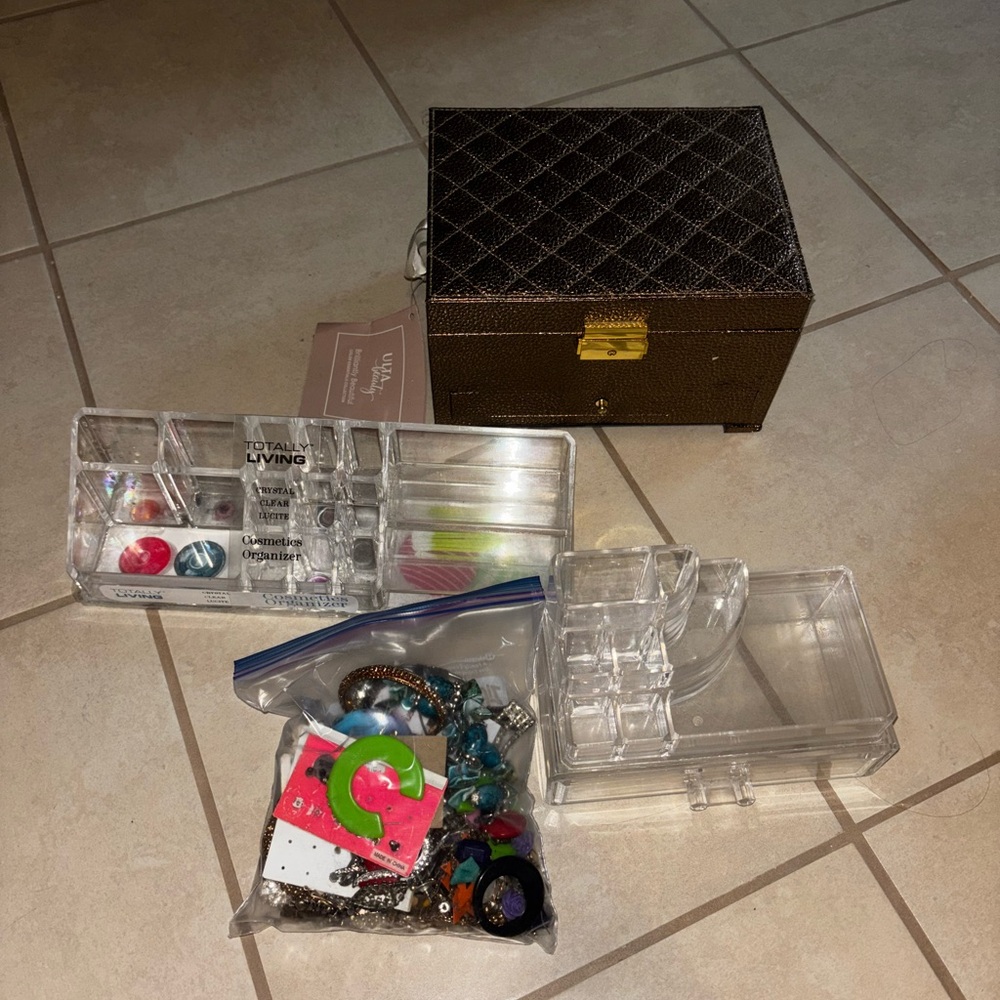 Jewelry organizers and a pack of random fashion jewelry